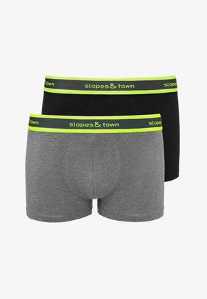 Twee paar boxershort in zwart en grijs katoen. Elk heeft een brede groene en grijze elastische tailleband met "slopes & town" branding.
