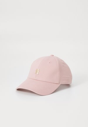 Pink baseball cap made of cotton blend fabric, featuring a structured crown, curved brim, and a gold logo accent on the front.
