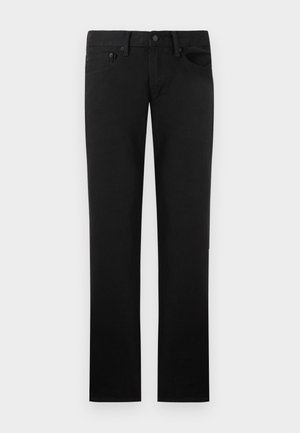 Svarte jeans med rette ben, fem lommer, beltehemper og knappelukking i livet, vist mot en ensfarget bakgrunn.