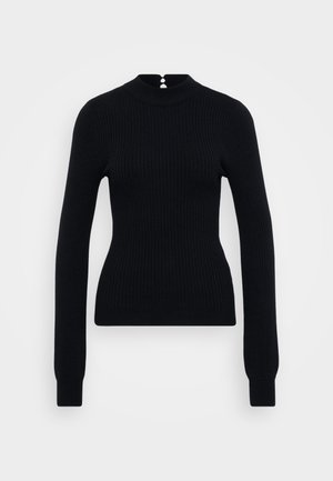 Black ribbed sweater with a high neckline and long sleeves. Features a button accent at the back and a fitted silhouette.