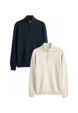 Two ribbed mock neck sweaters with half-zip closures; one navy blue and one light beige, shown against a white background.