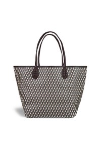 Woven tote bag with a geometric pattern in navy, beige, and gray. Features dark brown leather handles and accents. Spacious, structured design.