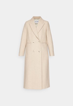Beige Wollmischungsmantel mit Doppelreiher-Design, eingeknöpftem Kragen und zwei vorderen Taschen. Verfügt über große Knöpfe und eine glatte Textur.