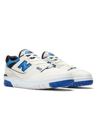 White athletic sneakers with black and blue accents, featuring a perforated design, laces, and a thick sole. Model number "550" visible.
