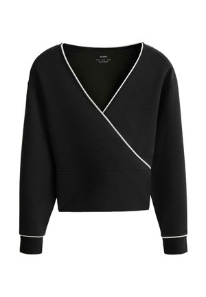 Zwarte top met lange mouwen in wikkelstijl, witte biezen langs de halslijn en manchetten, geribbelde polsmouwen en een licht cropped pasvorm.