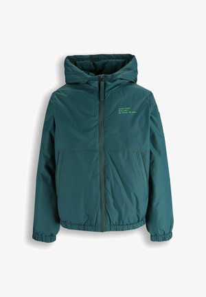 Turkusowa kurtka z kapturem, zamkiem z przodu, elastycznymi mankietami, dwoma kieszeniami oraz żółtym napisem na lewej piersi: "Street Talent. Real Talk. No Filters. No Limits."