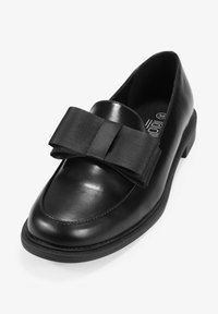 Black leather loafer with a wide fabric bow on the front, rounded toe shape, low heel, and smooth texture. Size 36 marked inside.