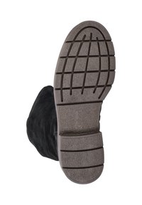 Black suede ankle boot with a textured brown rubber sole featuring a grid pattern and brand logo. Designed for comfort and durability.