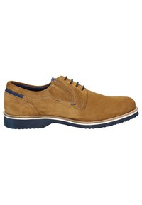 Chaussures en suede beige à lacets avec un bout arrondi, des accents bleu marine et une semelle intermédiaire blanche. La semelle est texturée pour une meilleure adhérence et durabilité.