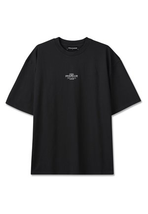 Svart oversized t-skjorte med korte ermer, rund hals og liten hvit "PEGADOR"-logo sentrert på brystet.