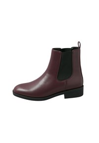 Bottine en cuir bordeaux avec des panneaux latéraux élastiques, bout arrondi, languette de tirage et talon bas empilé. Fini lisse avec semelle riblée.