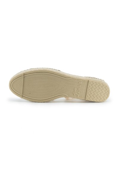 Soletta di sneaker in gomma beige con texture a motivo. Presenta bordi arrotondati, motivo a zigzag e dettaglio del logo vicino al tallone.