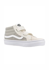 Hoge sneakers met een grijs en crème kleurenschema, gemaakt van suède en canvas, met klittenbandsluitingen en witte rubberen zolen.