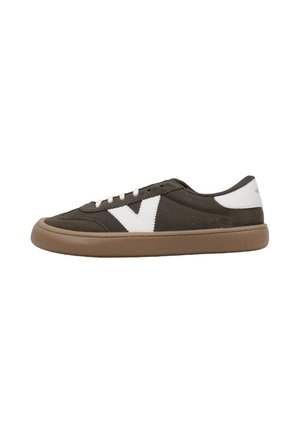 Low-top dark brown sneaker with white laces, a white "V" logo on the side, white heel patch, and gum rubber sole.