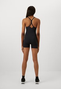 Under Armour MOTION SHORTS BODYSUIT - Gimnastički dres - black/jet gray