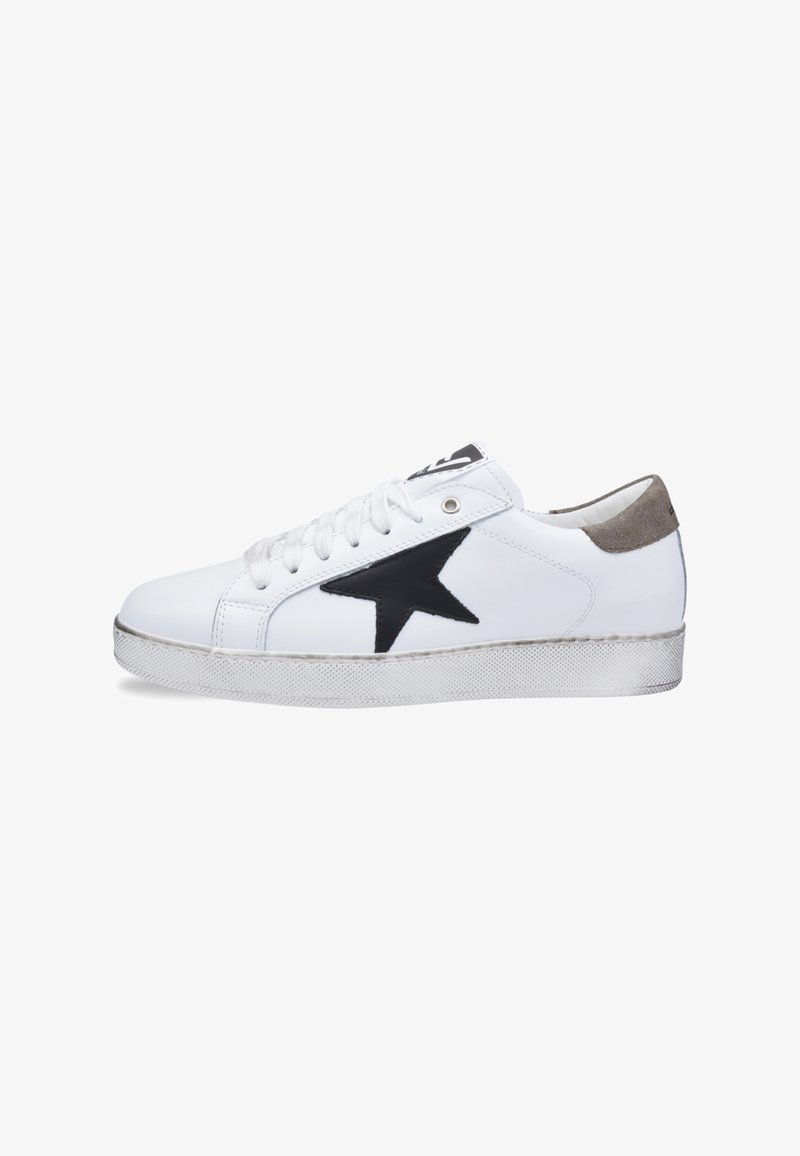 White leather sneaker with a large black star on the side, grey suede accent on the heel, white laces, and textured white sole.