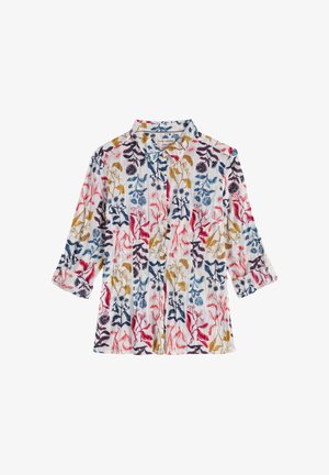 Valge nööpidega pluus, mille varrukad on üles keeratud, kaunistatud mitmevärviliste lille- ja lehemustritega punases, sinises, kollases ja lillakas toonis.