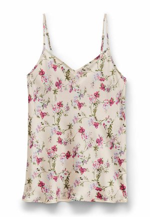 Kremfarvet camisole med tynde stropper, prydet med et mønster af pink og lilla blomster samt grønne bladdetaljer.