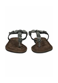 Sandali neri con zeppa con pietre decorative argento, suola in similpelle marrone, suola piatta e bretelle regolabili. Design open-toe.