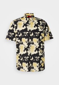 Camisa de manga corta con fondo negro y estampado floral en amarillo y blanco. Confeccionada en tela ligera y con cuello estándar.