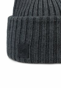 Dark gray knit beanie with ribbed texture and a black rectangular logo patch featuring rounded edges. The design hugs the head closely.