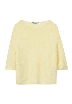 Light yellow knitted short-sleeve sweater with a wide round neckline and a loose, boxy fit.
