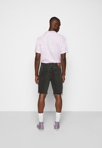 Levi's® LOOSE - Calções de ganga - hard candy short