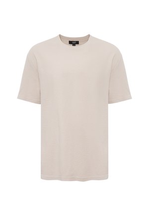 Beige short-sleeve crew neck T-shirt with a loose fit, displayed against a white background.