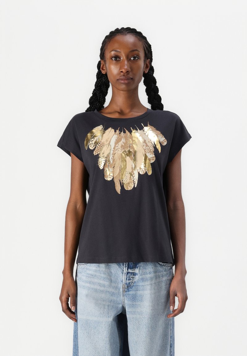 Black short-sleeve t-shirt featuring a metallic gold feather print across the chest. The fabric is soft, with a relaxed fit.