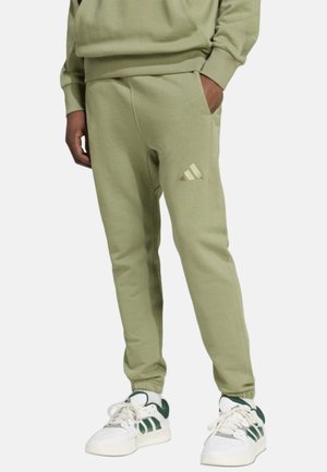 adidas Originals, ADIDAS ORIGINALS JOGGINGHOSEN ALL SEASON - Jogginghose - light green gold