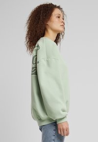 Karl Kani Sweatshirt - light mint