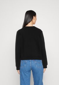Guess TRIANGLE - Mikina - jet black
