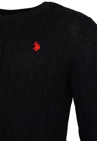Black cable-knit sweater with a red embroidered polo player logo on the chest, featuring a round neckline and long sleeves.