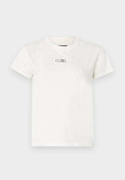 White cotton t-shirt with short sleeves, round neckline, and a rectangular black print label on the front featuring numbers and symbols.