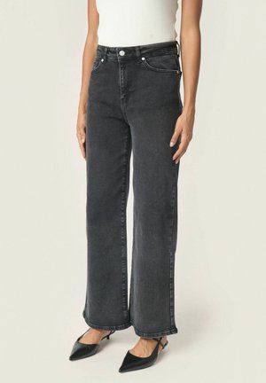 VANESA - Flared Jeans - black washed denim