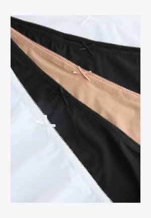 Trois paires de sous-vêtements féminins exposées en blanc, noir et nude, avec un tissu lisse et une délicate dentelle avec des nœuds.