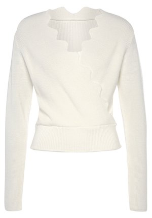 White ribbed knit sweater with a scalloped V-neckline and long sleeves, featuring a fitted waist and soft texture.