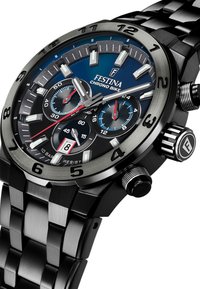 Črno nerjaveče jekleno uro z modrim dialom, več kronografskimi poddialami, svetlečimi kazalci in prikazom datuma ob 6. Uteži so bold numeri.