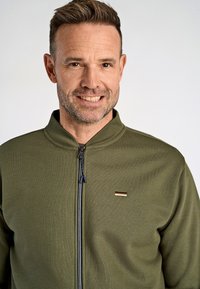 Jack's Sportswear BASEBALL COLLAR - Vetoketjullinen college - army