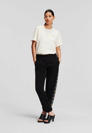 IKON OUTLINE - Verryttelyhousut - black