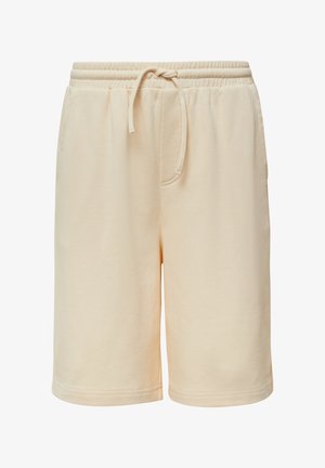 Béžové bavlnené šortky s elastickým pásom a šnúrkou. Majú dve bočné vrecká, voľný strih, hladkú textúru a dĺžku po kolená.