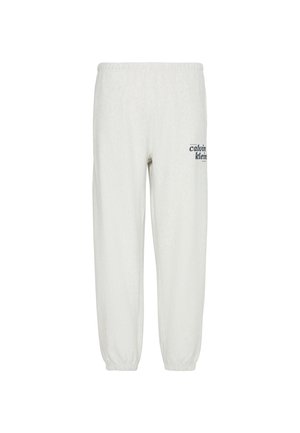 Λευκή φόρμα με ελαστική μέση και μανσέτες, με μικρό μαύρο λογότυπο Calvin Klein στο πάνω δεξί μηρό.