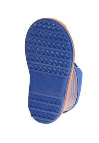 Semelle de chaussure en caoutchouc bleu avec un accent orange. Présente des rainures texturées pour l'adhérence et une surface supérieure lisse.