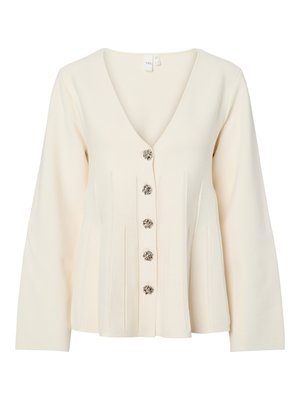 Μπεζ, μακρυμάνικο κασκόλ με V-λαιμόκοψη, διακοσμημένο με πέντε κουμπιά και πτυχώσεις στο μπροστινό μέρος. Μαλακό πλεκτό ύφασμα.