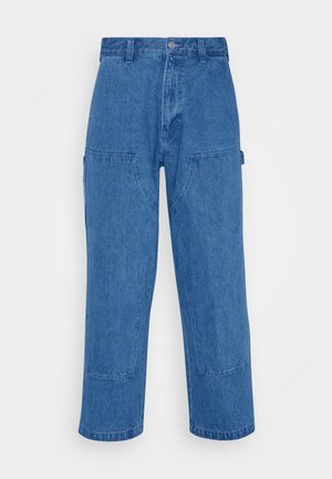 Blue denim cargo pants with a high waist, wide legs, and large front pockets. Features stitching details and a button closure.