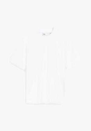 T-shirt bianca a maniche corte in cotone, caratterizzata da un colletto rotondo, una vestibilità rilassata e una texture liscia senza alcun motivo o accento visibile.