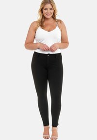 Elara STRETCH - Vaqueros pitillo - schwarz