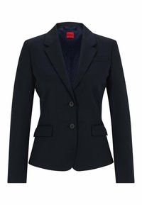 Blazer bleu marine à revers crantés, deux poches avant, deux boutons et doublure intérieure à motif. Coupe ajustée et texture lisse.