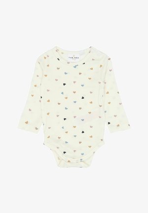 Kremfarvet langærmet babybodysuit med flerfarvede små hjerte-mønstre og tryklås ved bunden og skulderen.