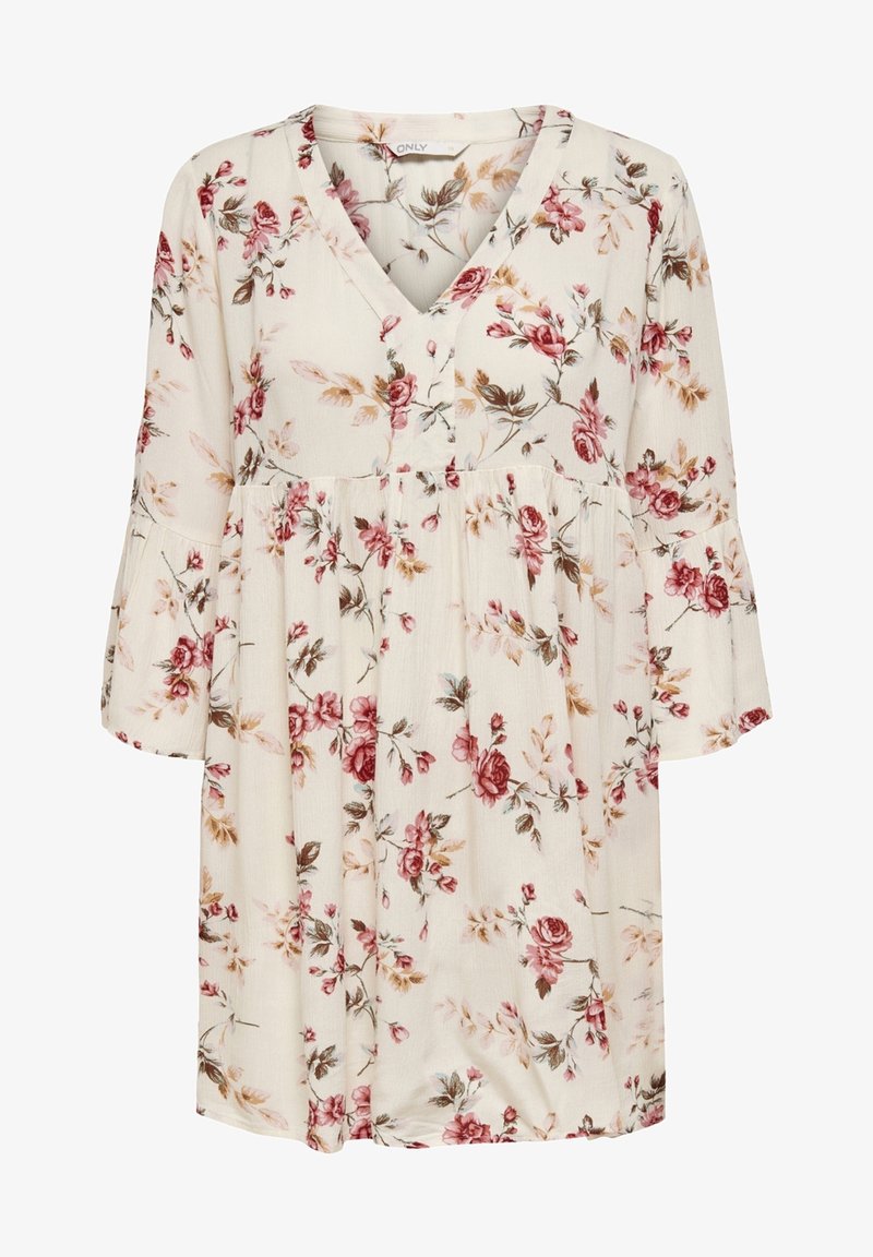 Vaaleanbeige mekko, jossa on V-muotoinen kaula-aukko ja kyynärpäihinsykköiset kellohihat. Mekossa on punaisia ja ruskeita kukkakuoseja. Pehmeä ja teksturoitu kangas.